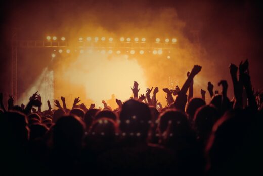 silhouette of people at concert