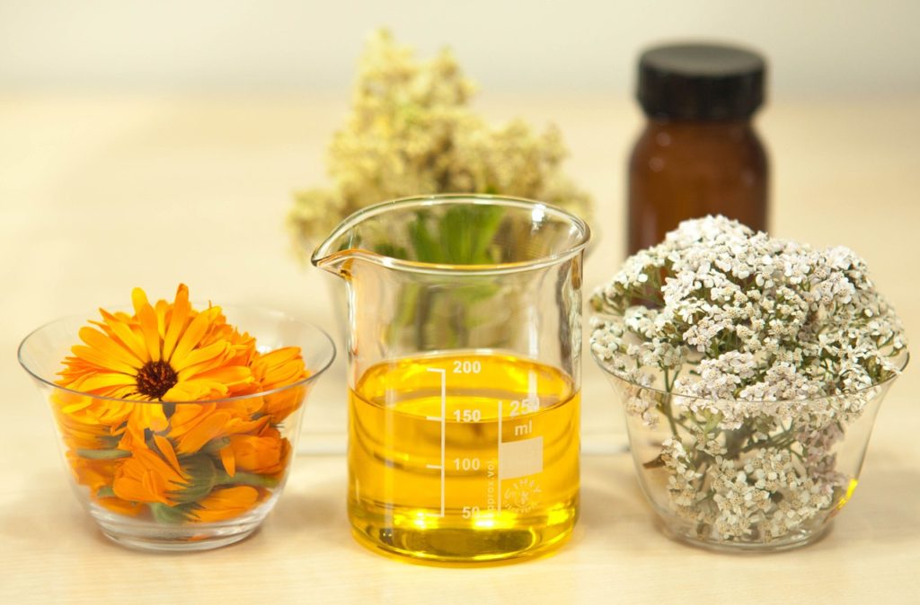 Yarrow and other herbs in glasses